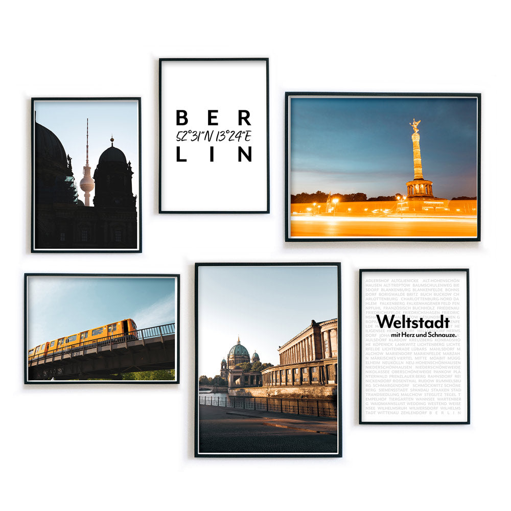 Farbenfrohes Berlin Poster Set. Berlin Motive der Siegessäule, dem Fernsehturm, Berlin Dom und einer BVG Bahn. Fertig gerahmt in schwarzen Bilderrahmen.