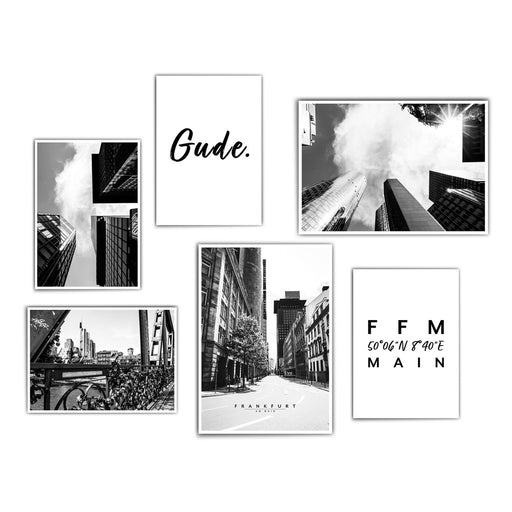 Fertige Frankfurt Bilderwand mit 4 schwarz weiß Fotografien der Frankfurter Skyline kombiniert mit Frankfurt Spruch Bildern.