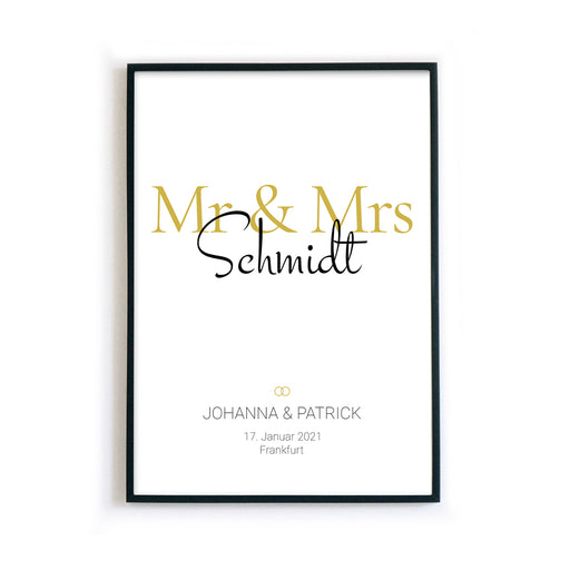 Mr & Mrs in Gold. Poster mit Personalisierten Nachnahmen, Vornamen, Ort und Datum. Bild im schwarzen Bilderrahmen.
